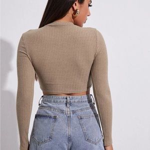 Cropped long sleeve top